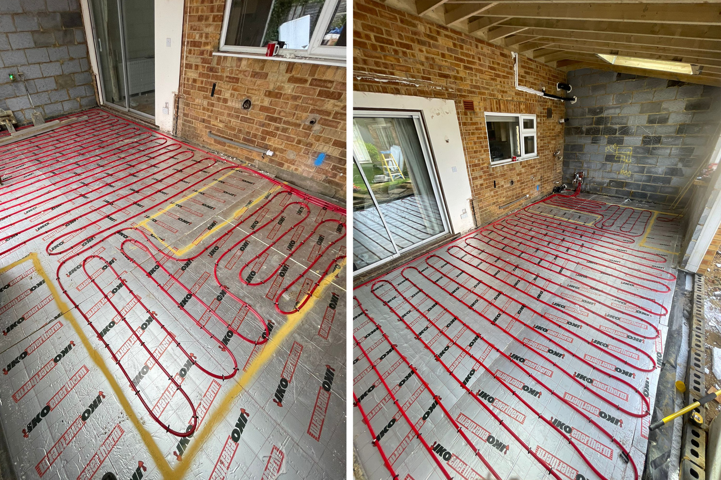 Coiled red underfloor heating pipe installed on top of foil backed insulation board